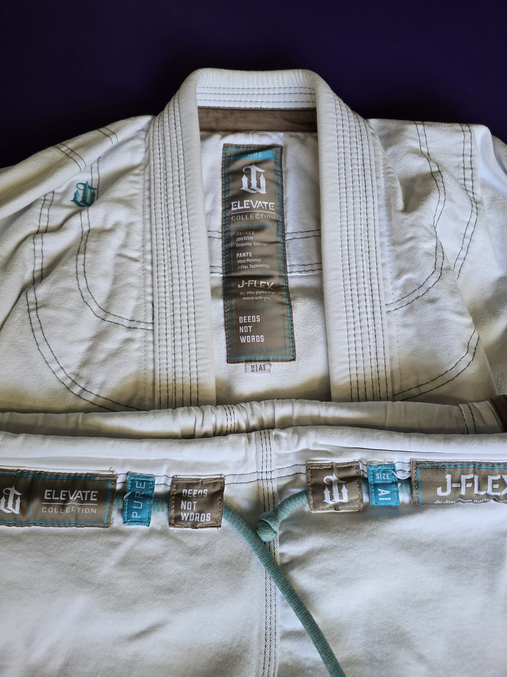 War Tribe J-Flex White Brazilian Jiu-Jitsu Gi with Teal Trim - Picture 3 of 3